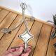 Pair of vintage wire coat hooks