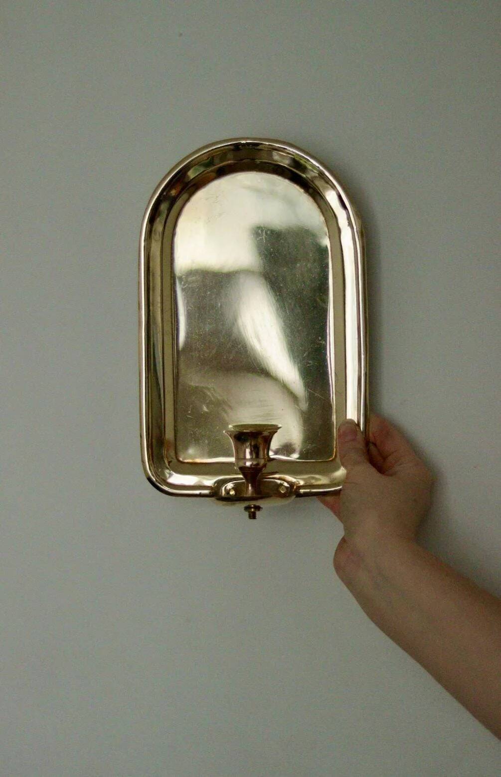 Single mid-century Swedish brass sconce