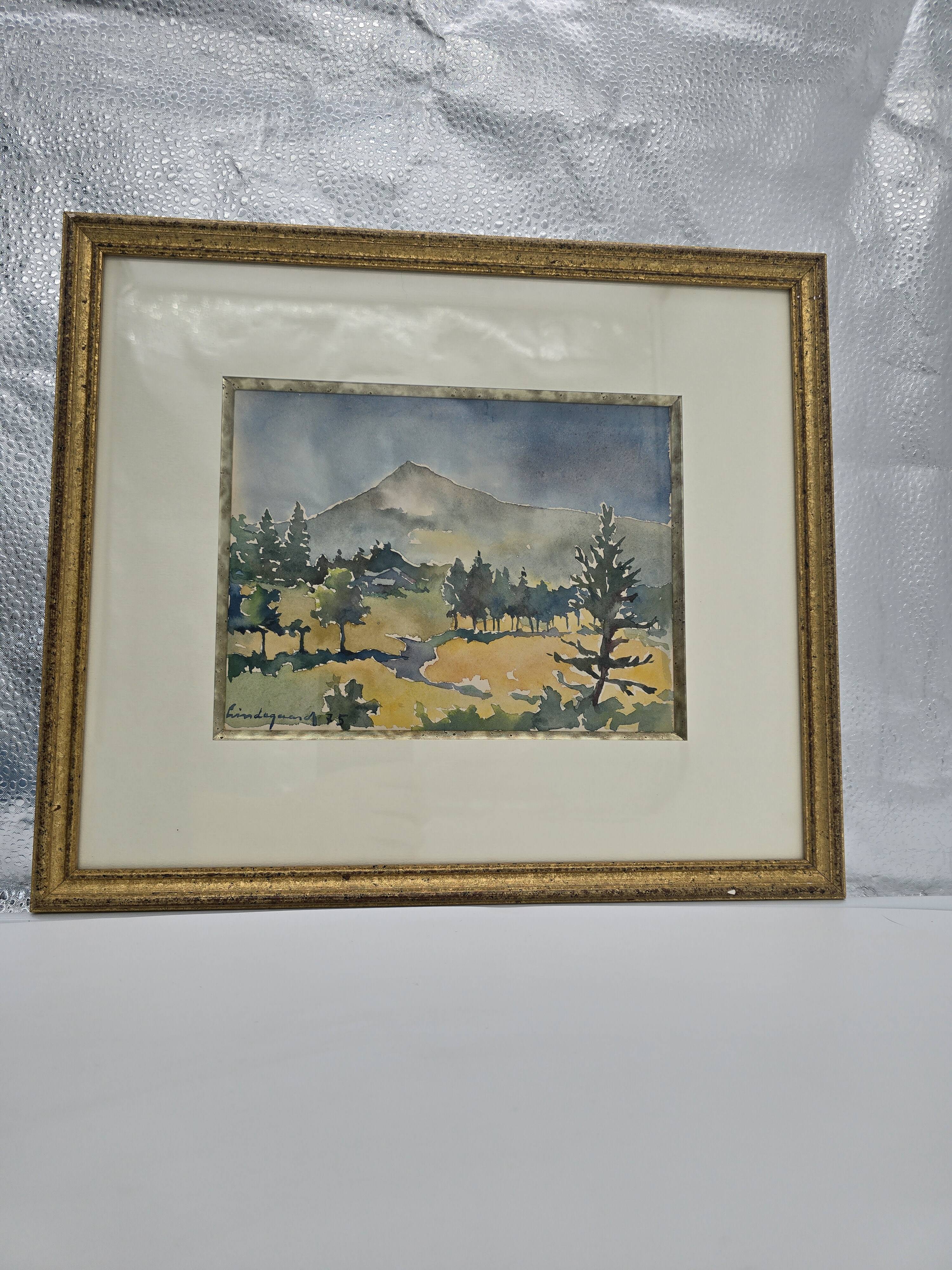 Framed watercolor by Henri Lindegaard 1975 - Forest and mountain landscape