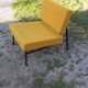 Vintage 50s armchair with black metal base and fabric seats