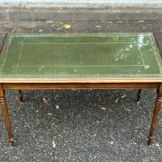 English Regency style coffee table in green leather with gilding and glass from the 1960s.