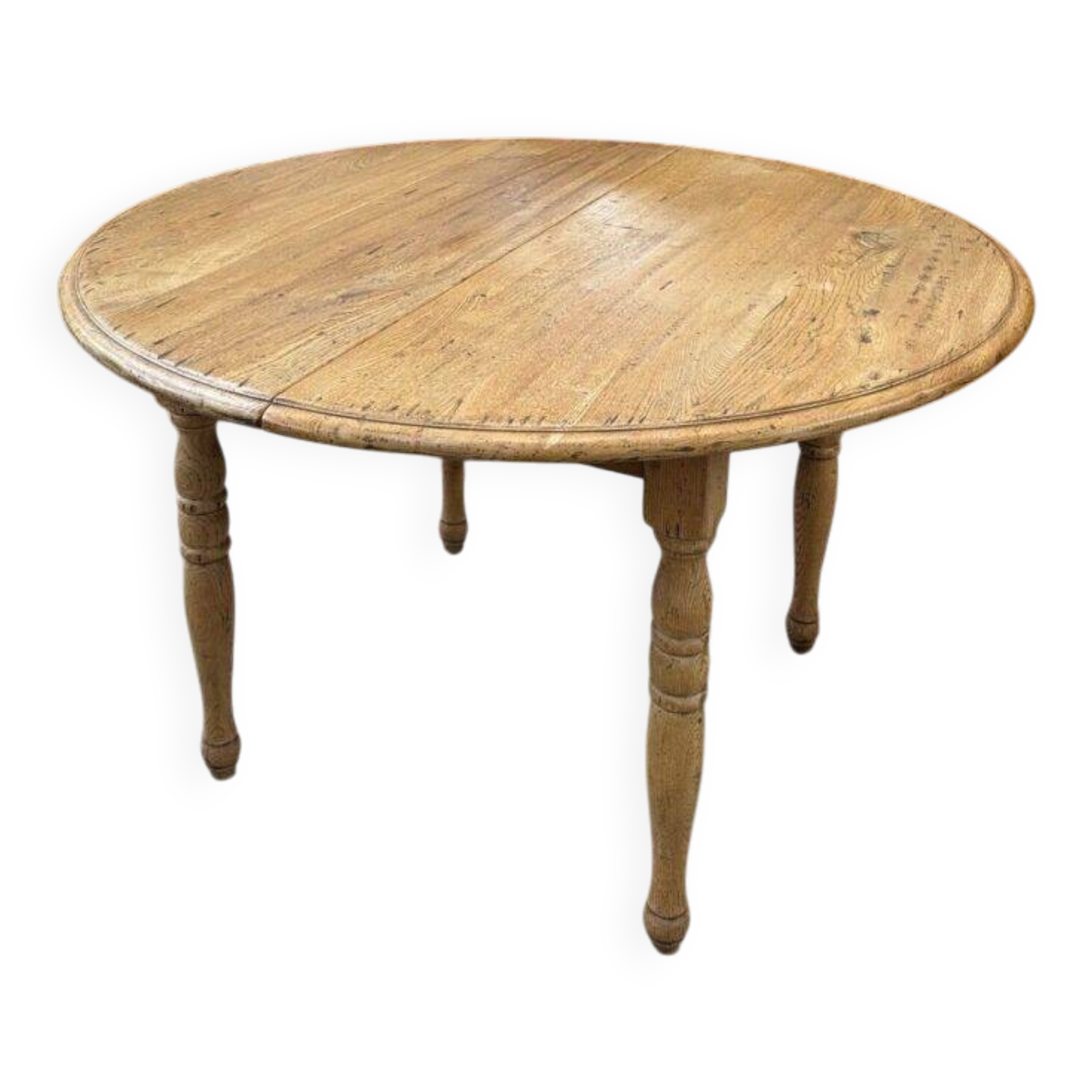 Round table in solid oak with its two extensions.