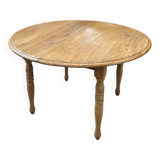 Round table in solid oak with its two extensions.