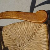 solid wood armchair, straw-covered seat
