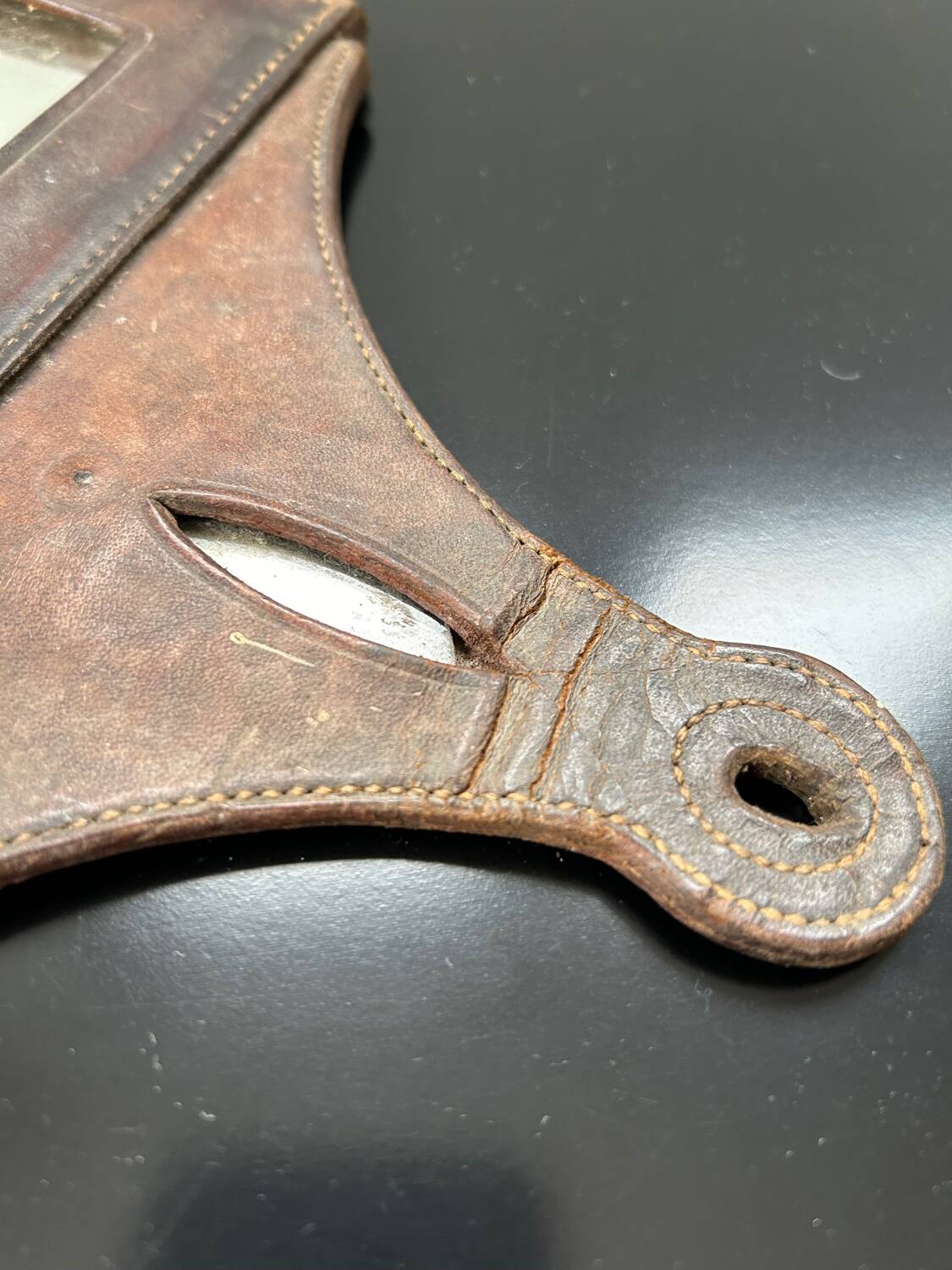 Mirror in saddle-stitched leather