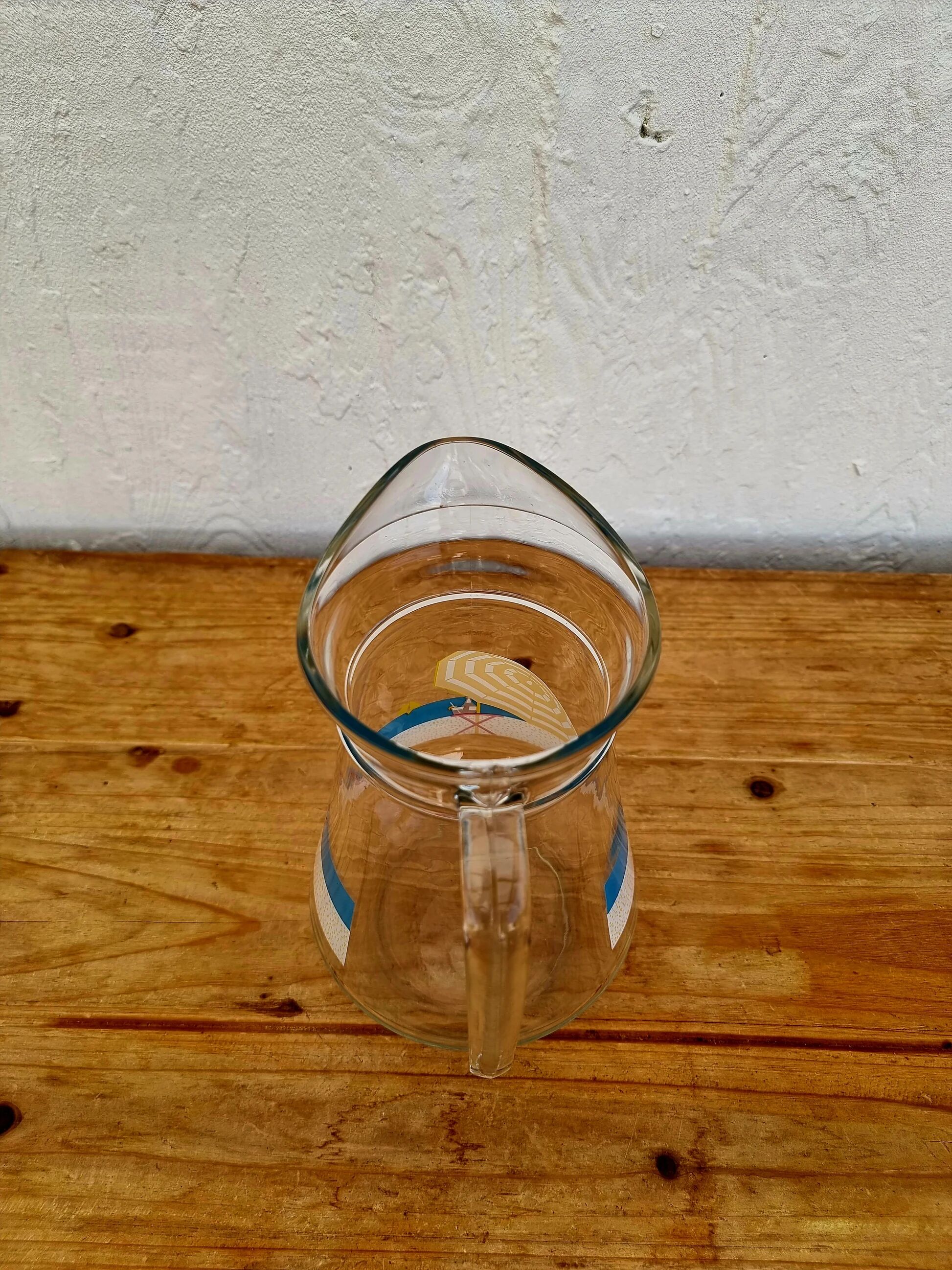 Jug with a summer design in vintage glass