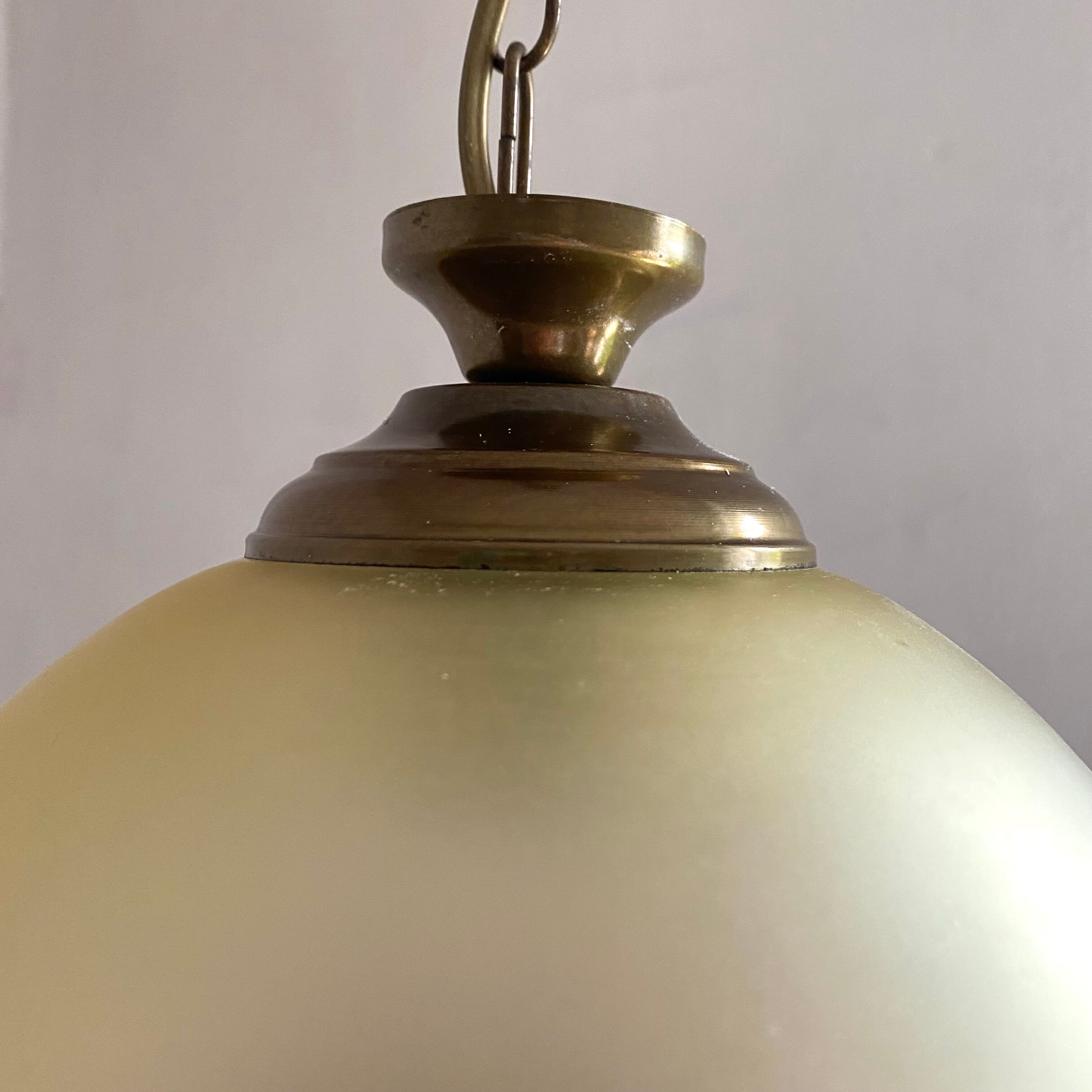 Pendant light in frosted glass and beads