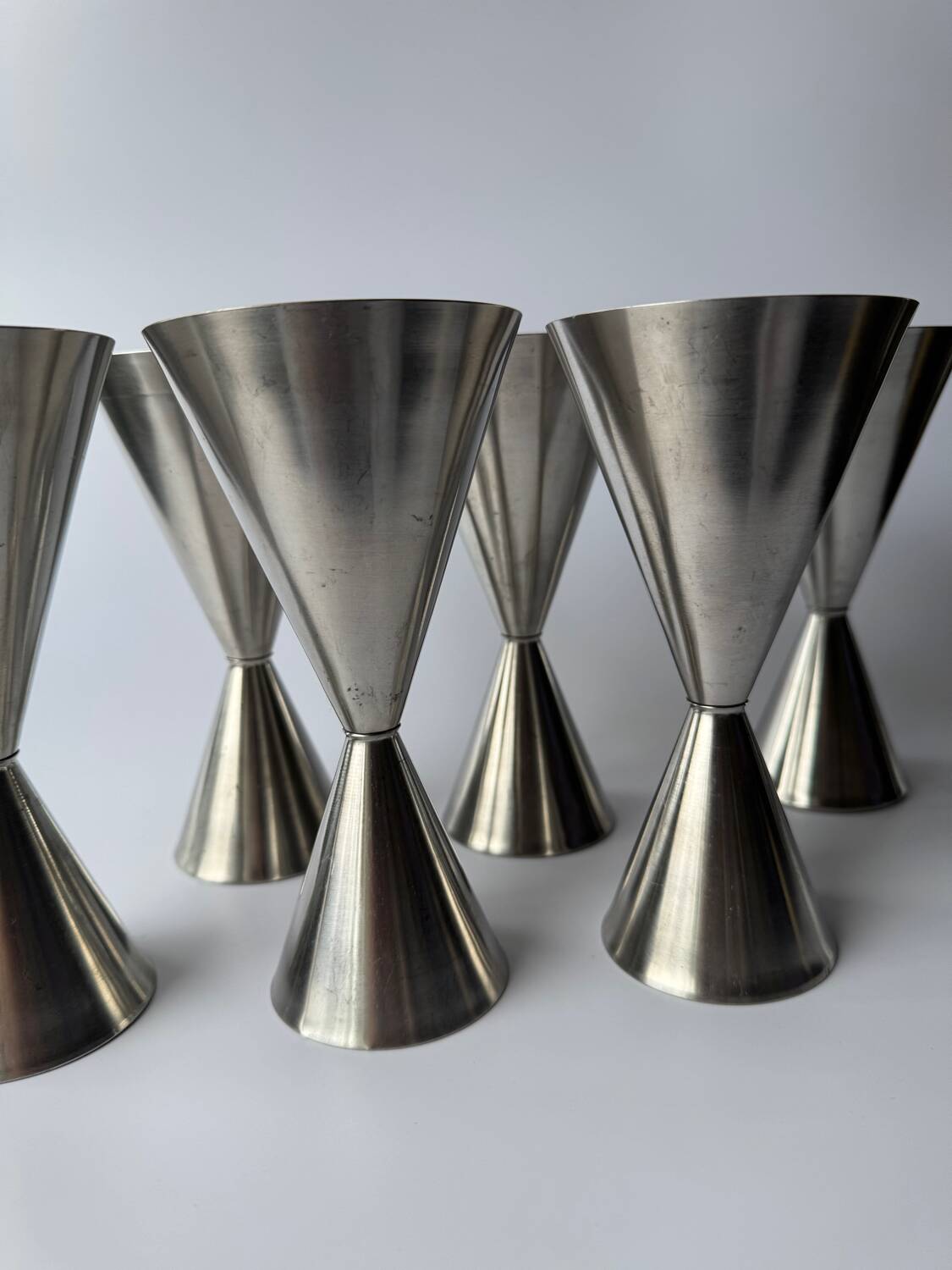 A set of 6 vintage minimalist stainless steel wine goblets