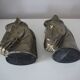 Set of two horse head candle holders.