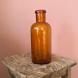 Amber glass bottle vase