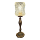 Vintage table lamp with a bronze base and moulded glass globe.