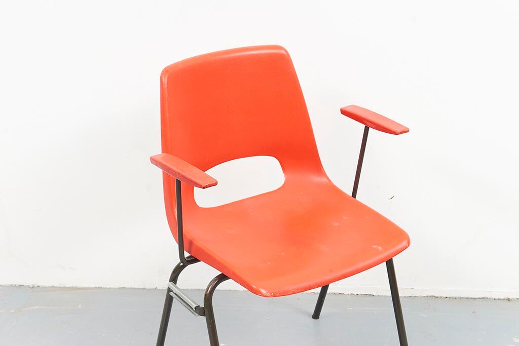 Vintage patio chair with armrests