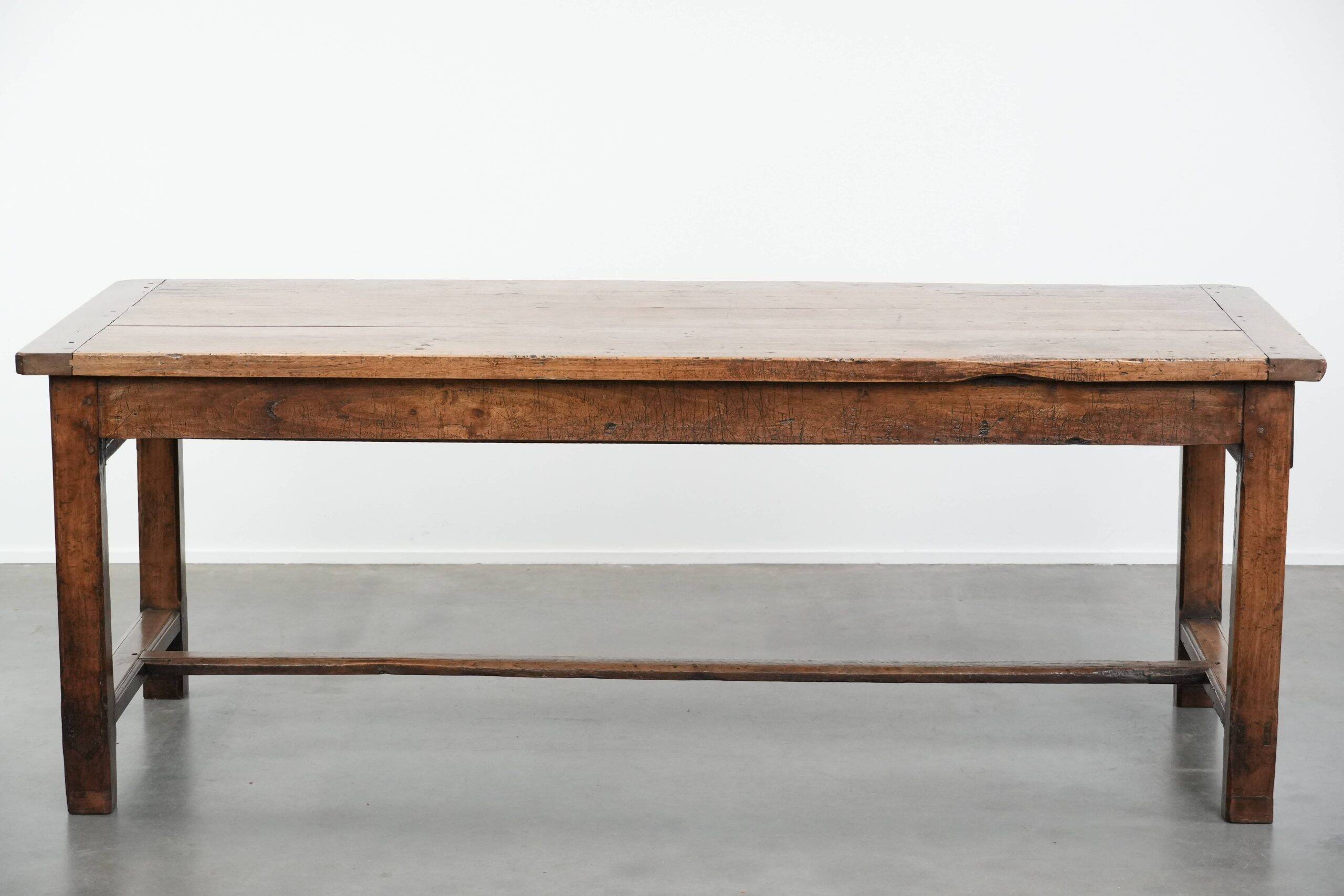 Robust French farmhouse antique dining table from the 18th century