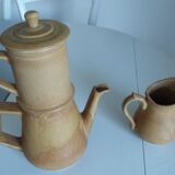 Old coffee maker and sandstone pitcher