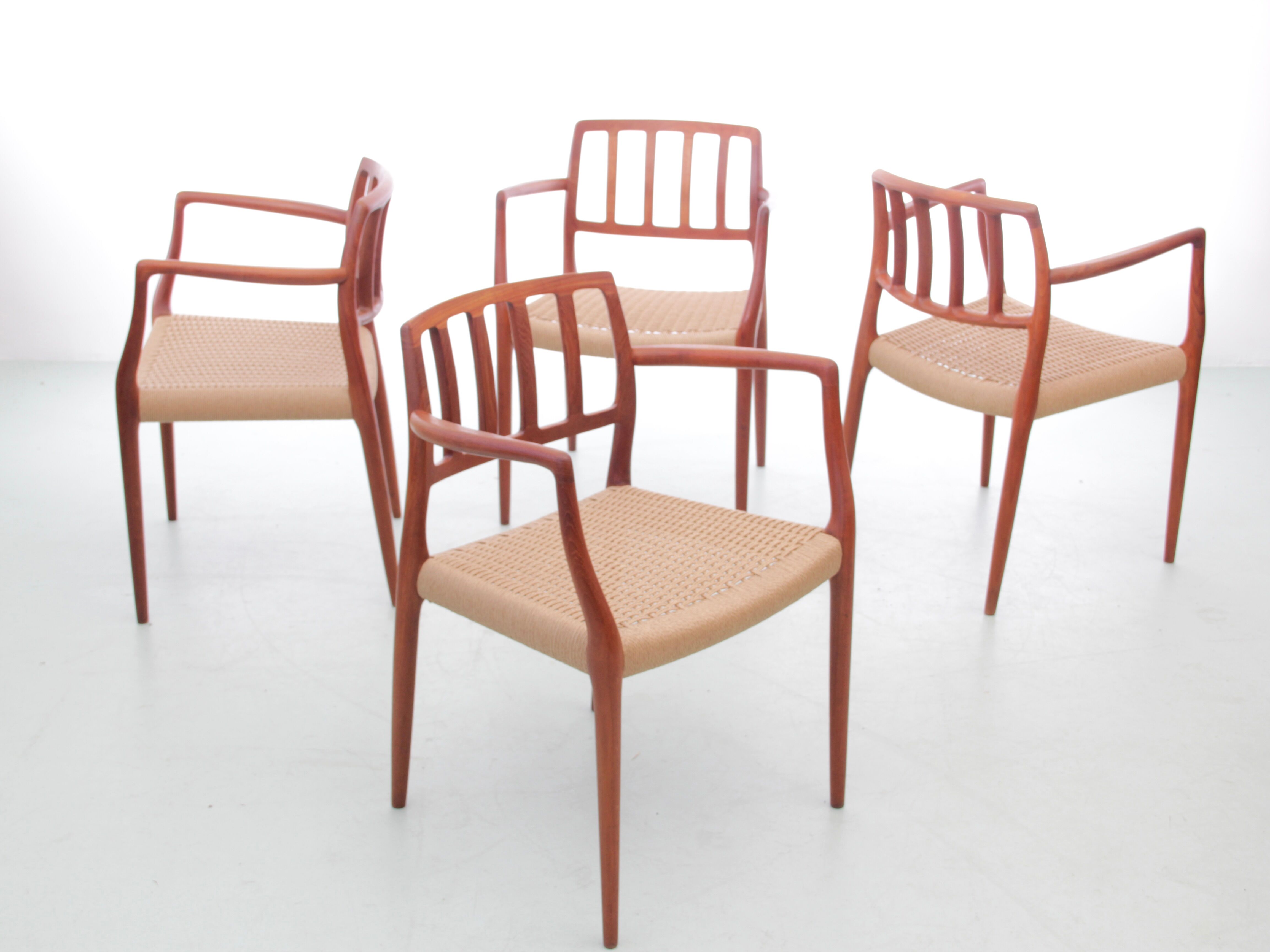 Suite of 4 Scandinavian teak armchairs model 66