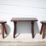 Set of coffee table and 2 carved wooden stools, brutalist