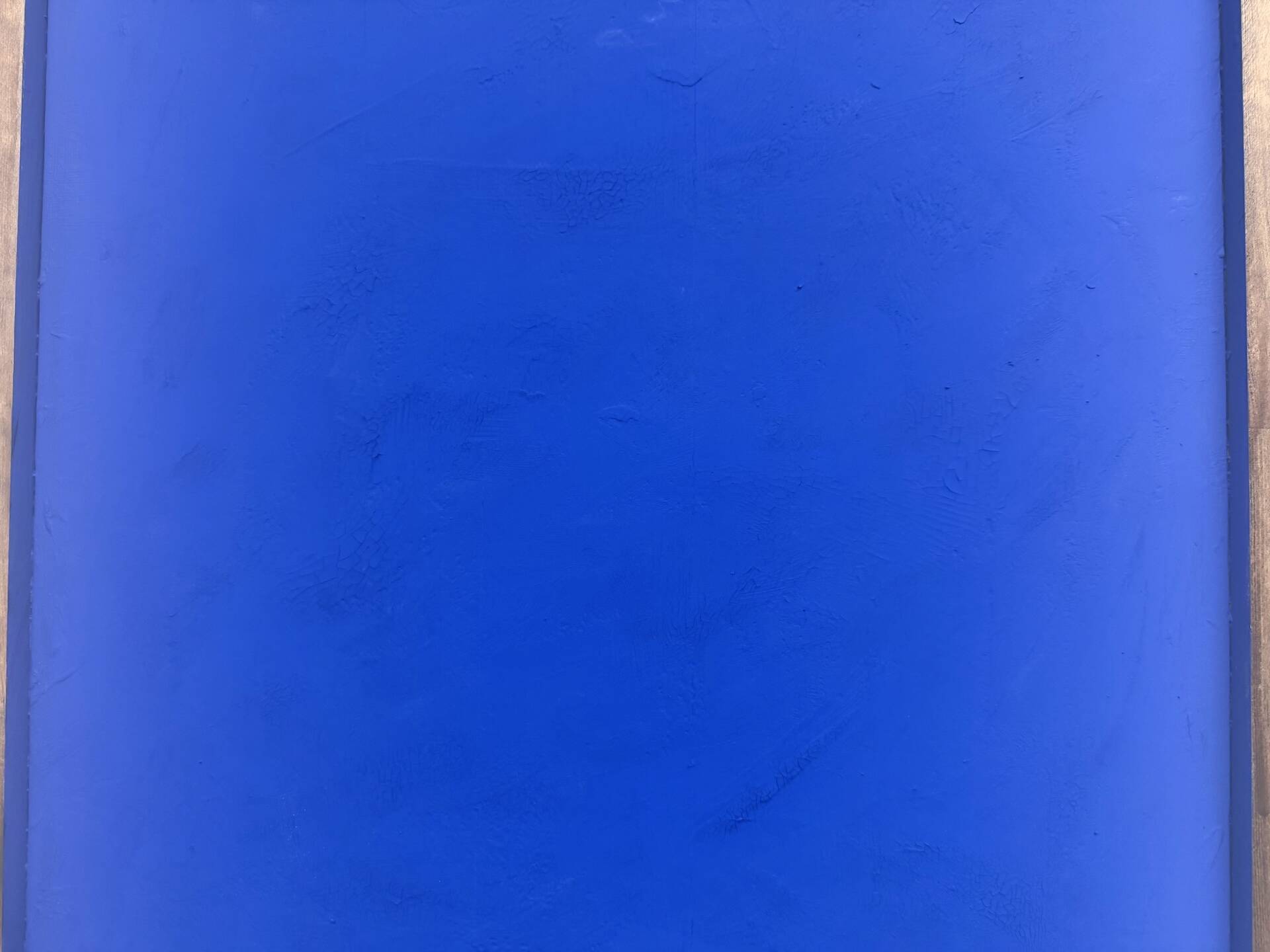 Monochrome table in ultramarine blue, acrylic on solid wood.