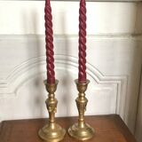 Pair of brass candlesticks with tassels