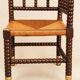 Fireplace corner chair in Louis XIII style, turned wood with braided rush, 19th century.