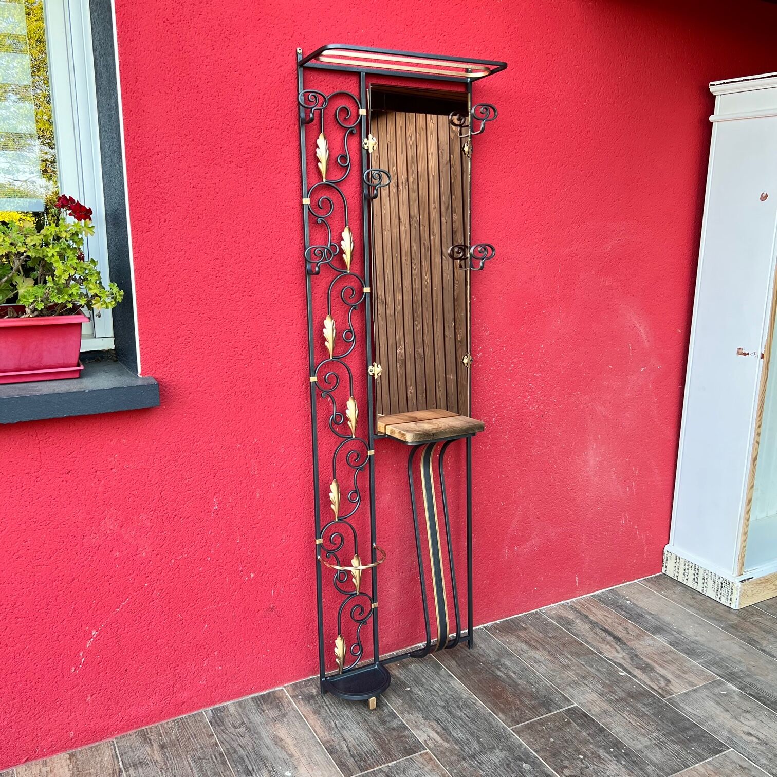 Vestiaire d’entrée en fer forgé noir et doré