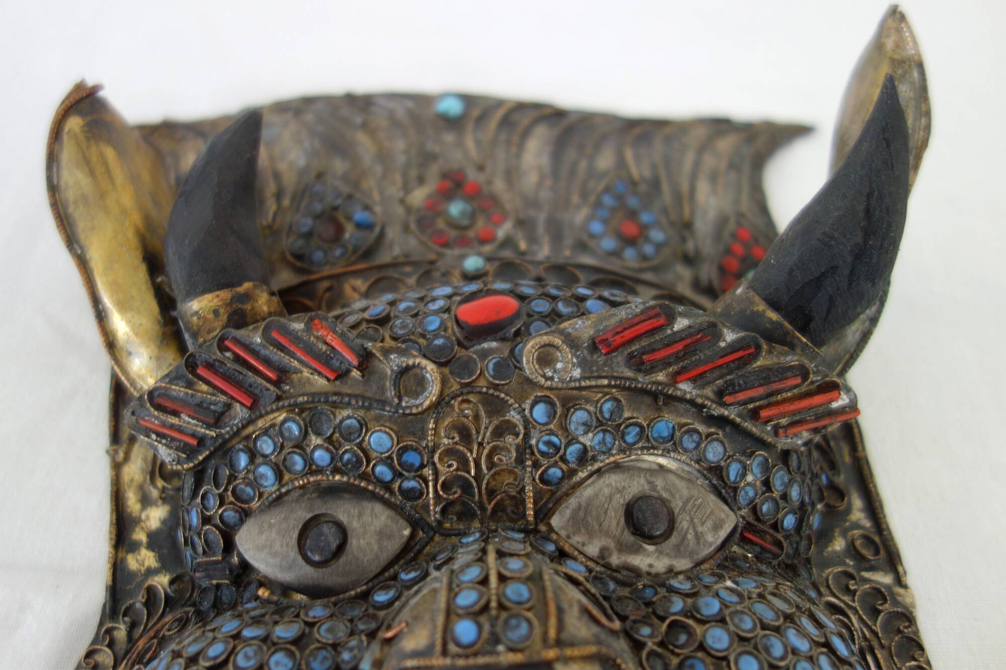 Vintage ritual mask in repoussé brass from Nepal/Tibet.