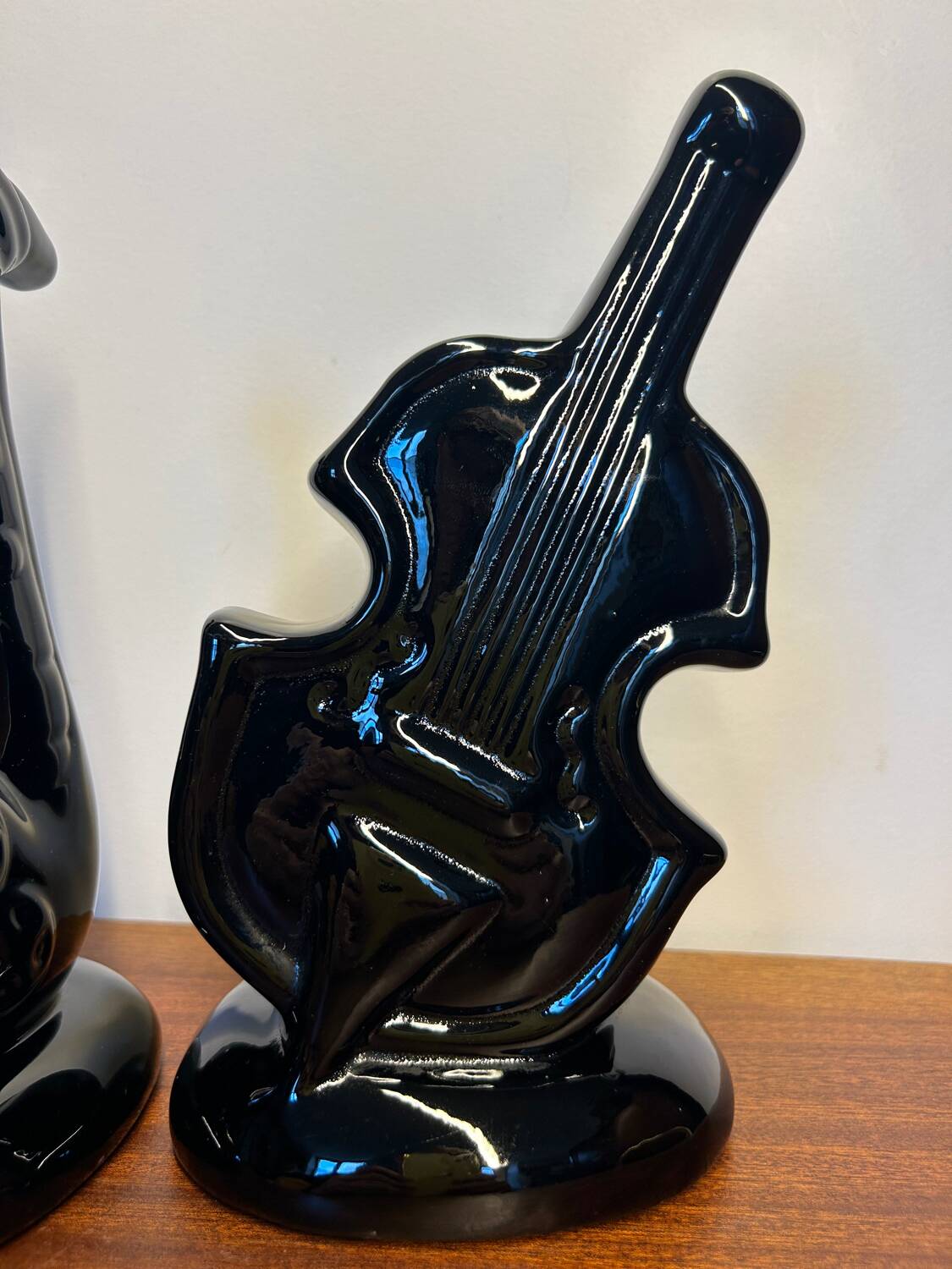 Black ceramic guitar and trumpet vases from the 60s