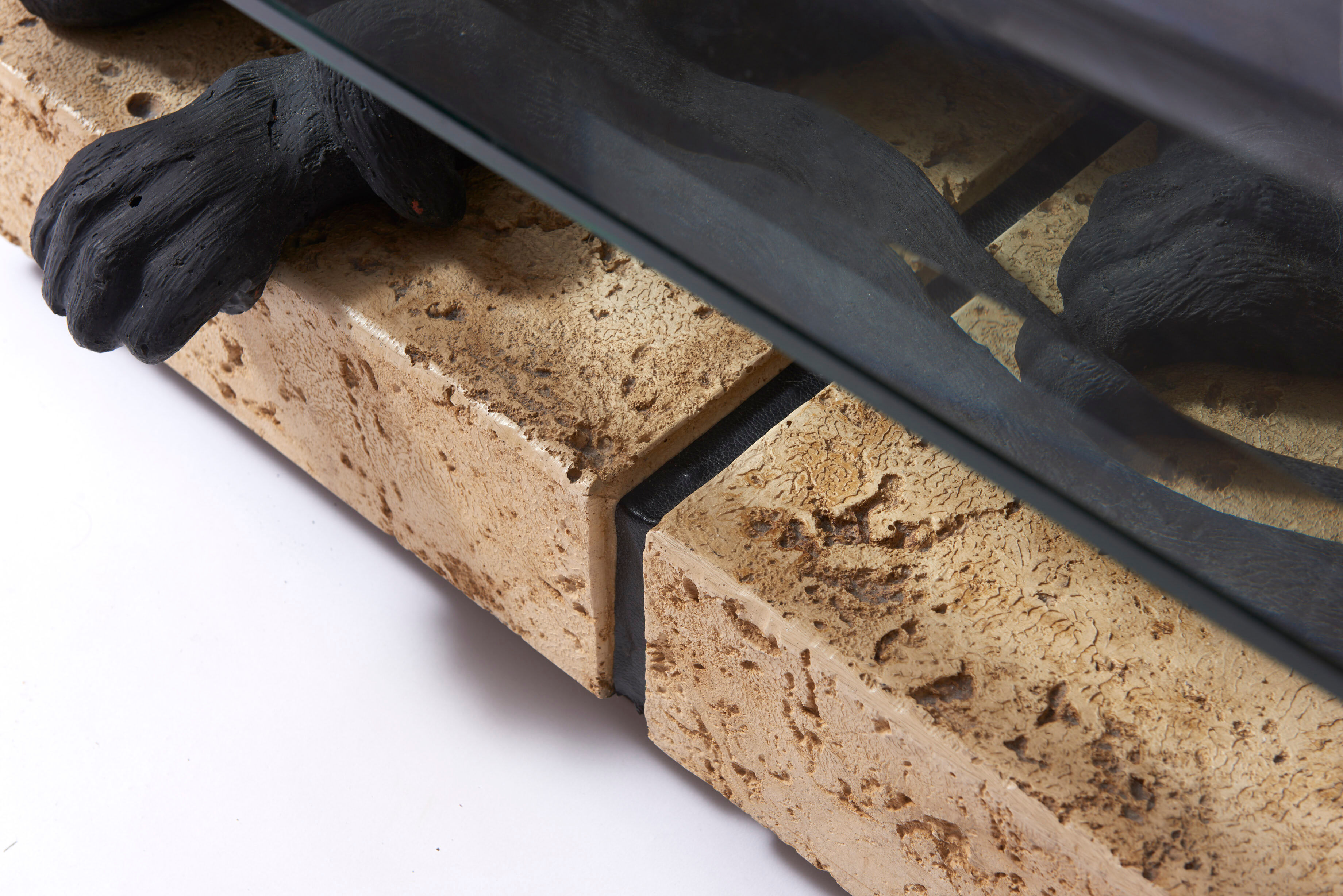 Panther coffee table on stone base and glass tablet
