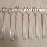 Set of 9 art deco silver oyster forks
