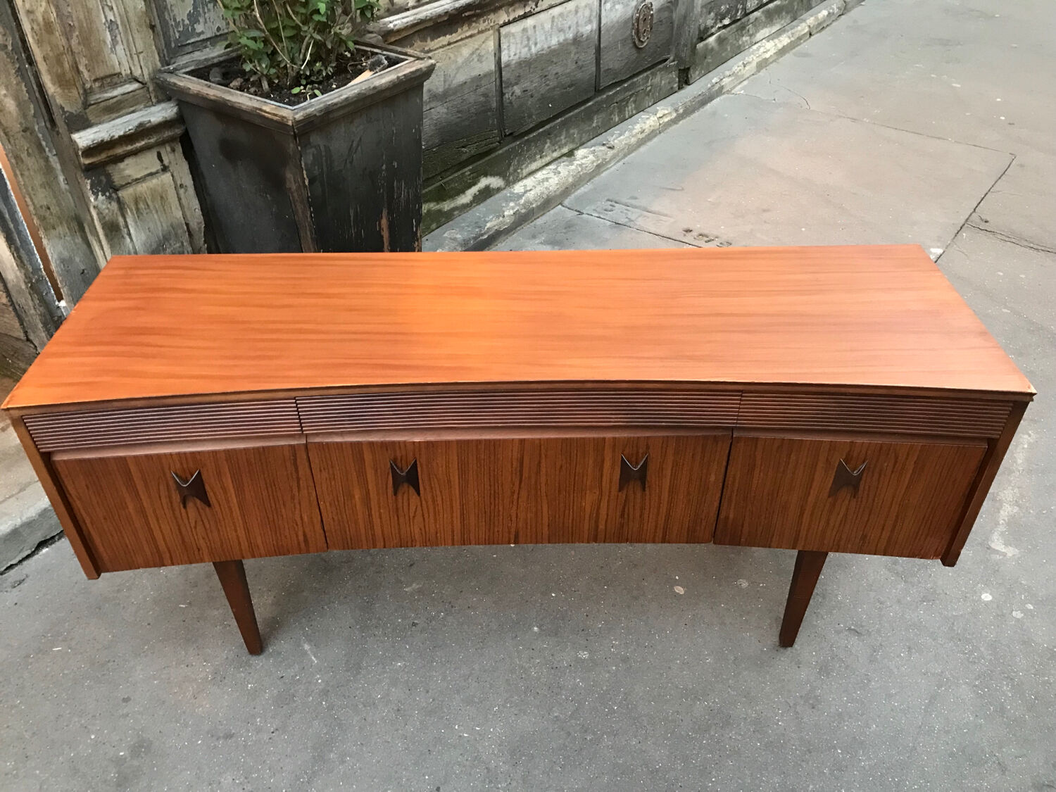 Curved teak enfilade from the 1960s in London.