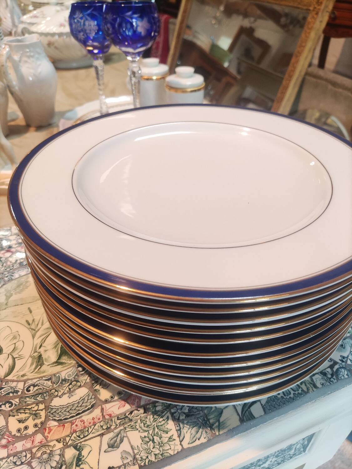 Six blue and gold Limoges porcelain dinner plates