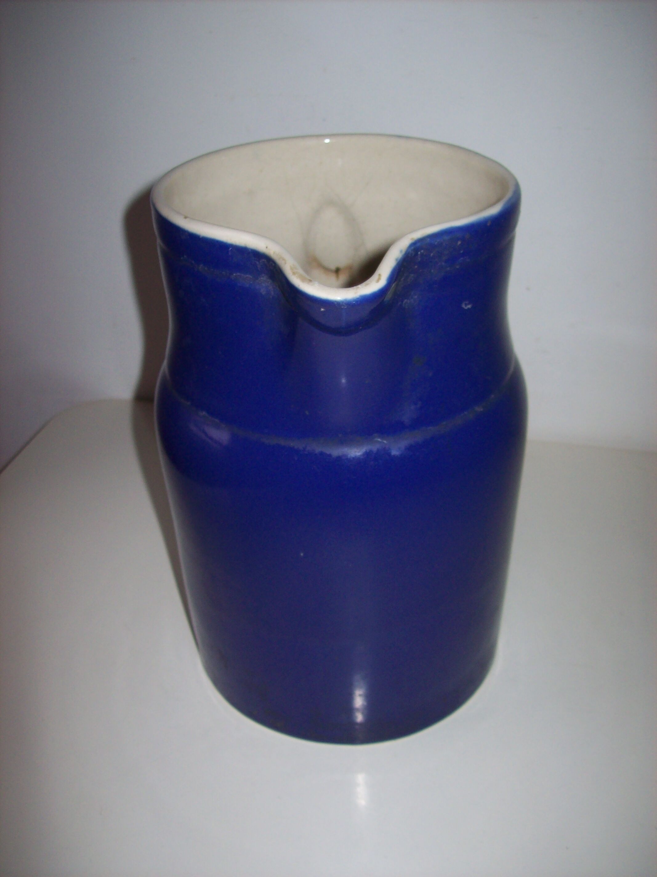 Old blue ceramic Digoin pitcher