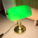 Gold and green banker’s desk lamp.
