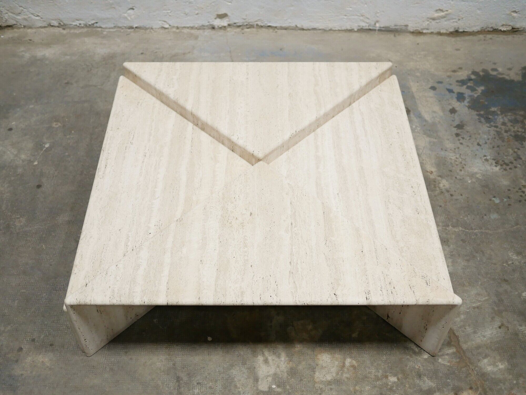 Series of 2 vintage travertine coffee tables published by Roche Bobois