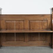 Antique oak church bench in Gothic style with beautiful wood carving