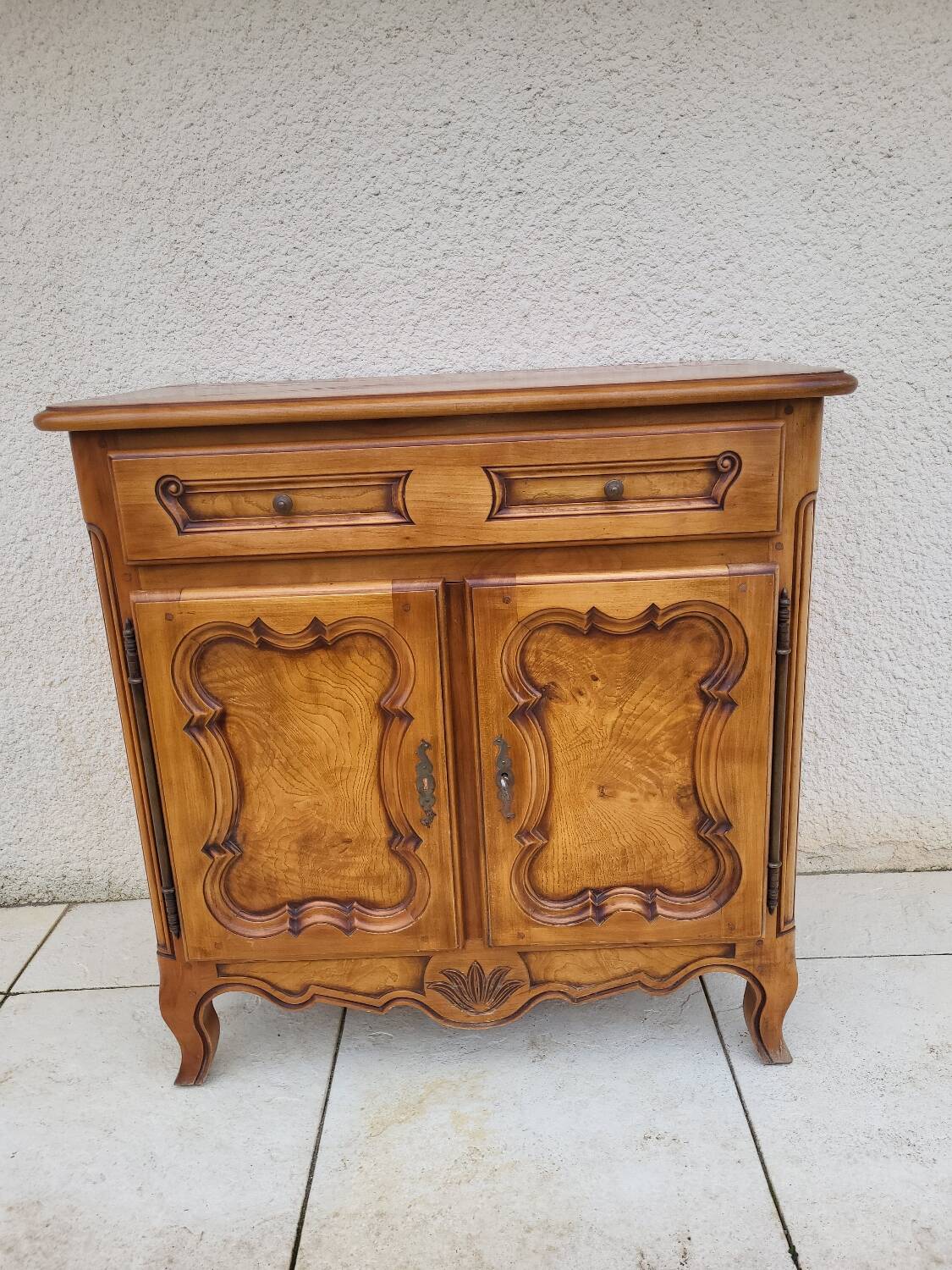 Small piece of furniture in cherry wood.