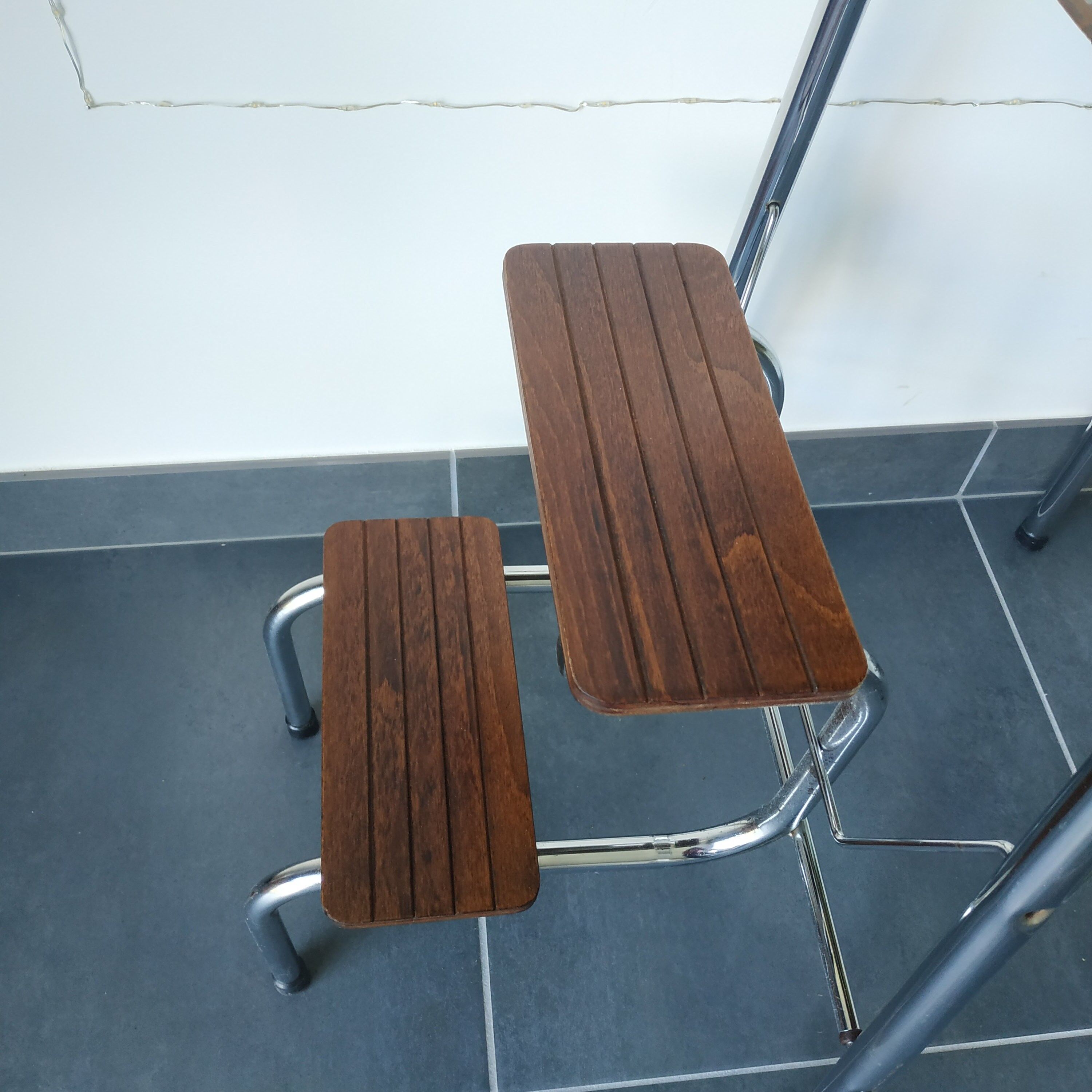Old retractable wooden stepladder