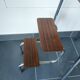 Old retractable wooden stepladder