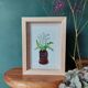 Composition of a bouquet of lilies of the valley in a shoe-shaped clay pot