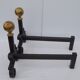 Pair of cast iron pegs with 2 balls in gilded metal L 40 cm