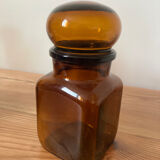 Old apothecary bottle in brown glass / jar