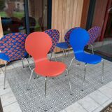 Blue and terracotta ant chairs with eye pattern
