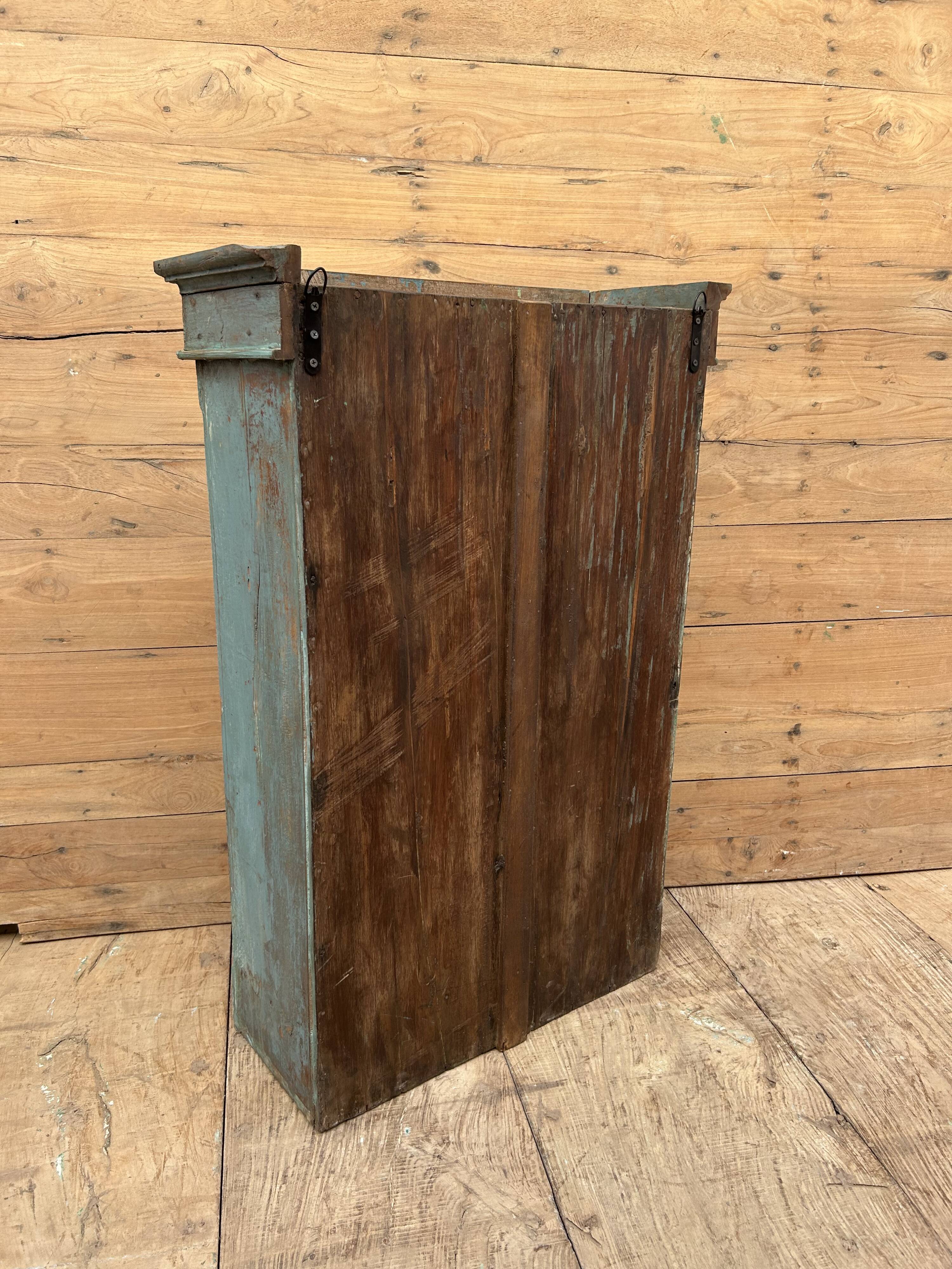 Wall display cabinet in Burmese teak with original patina.