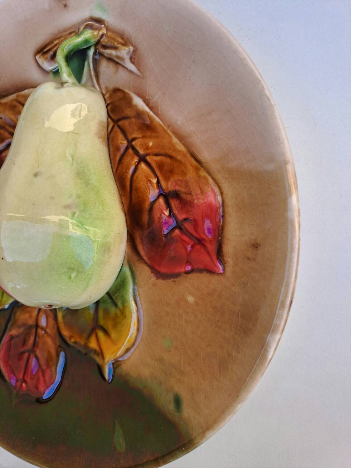 Pear slip plate in relief