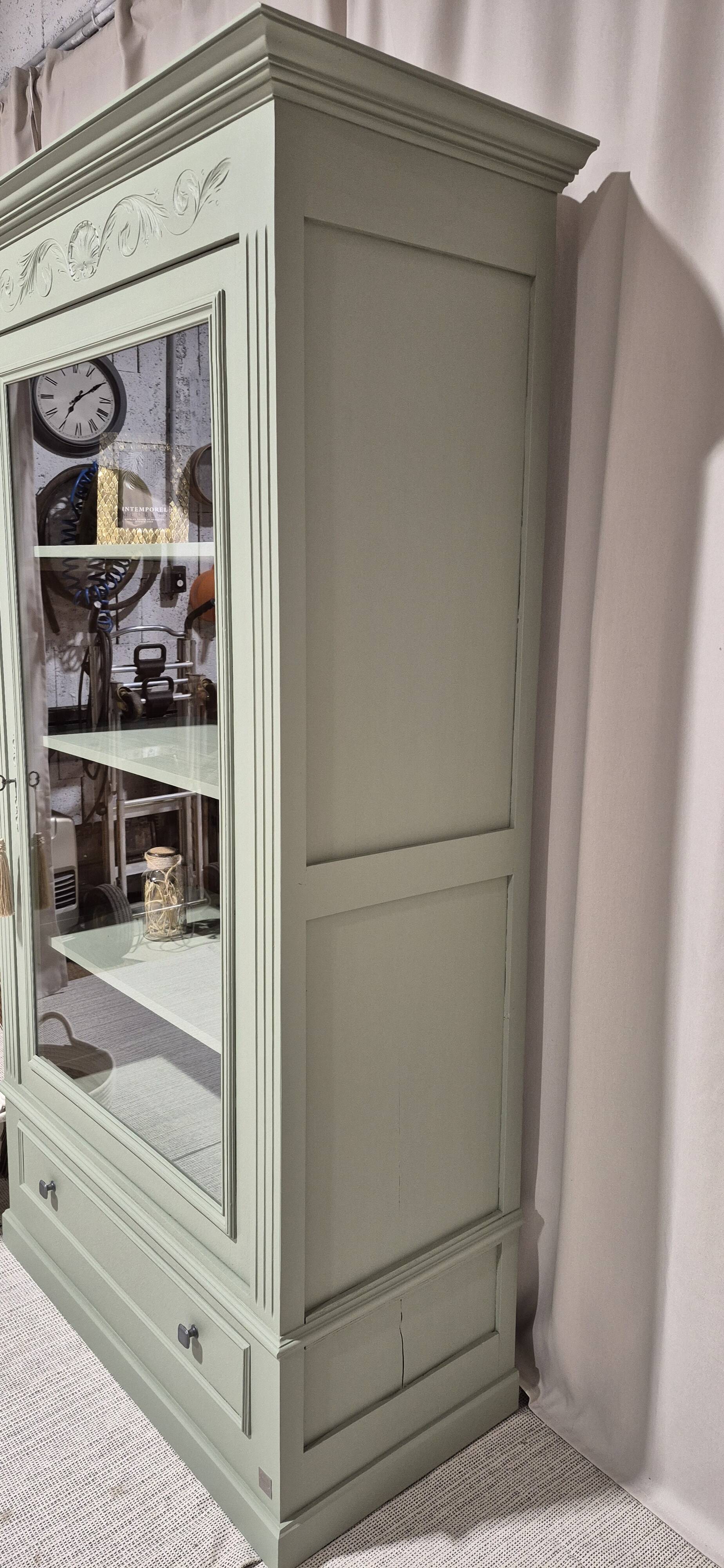 Glass display cabinet with drawer