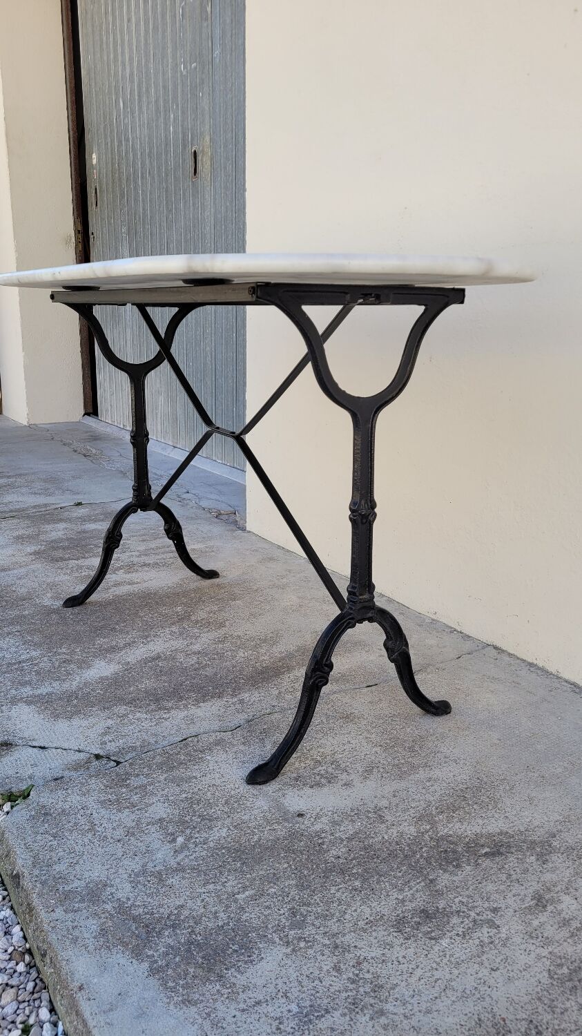 Cast iron bistro table and old oval marble top