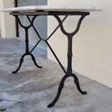 Cast iron bistro table and old oval marble top