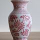 Chinese style flower vase with red and white flowers