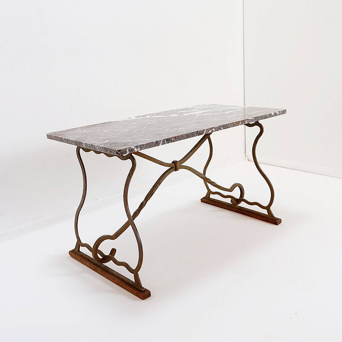 Wrought iron and marble coffee table
