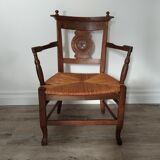 Straw armchair folk art.