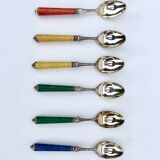 Set of eight enamelled silver spoons